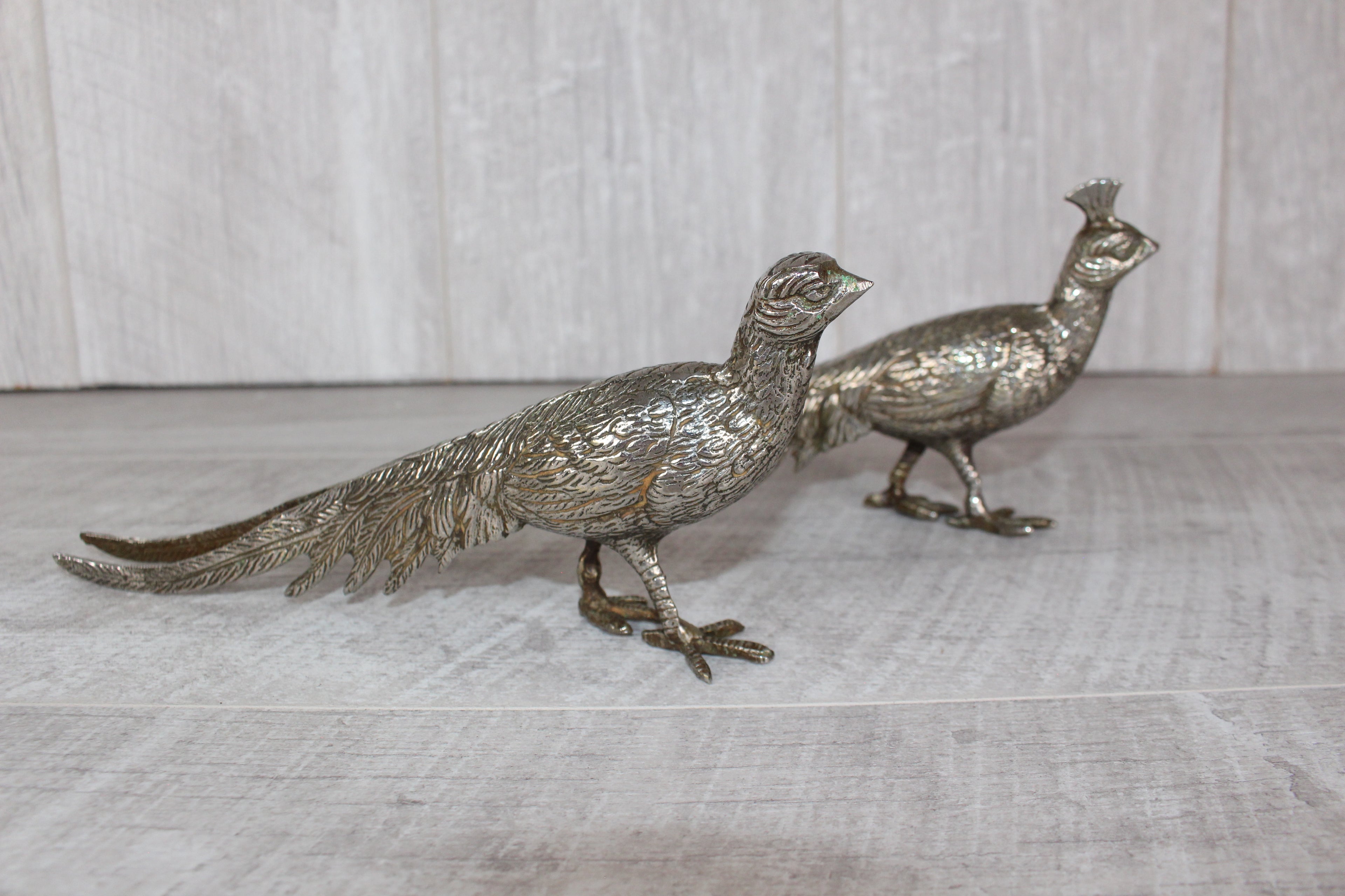 A Pair of Silver Plated Peacocks - Male and Female 10" length