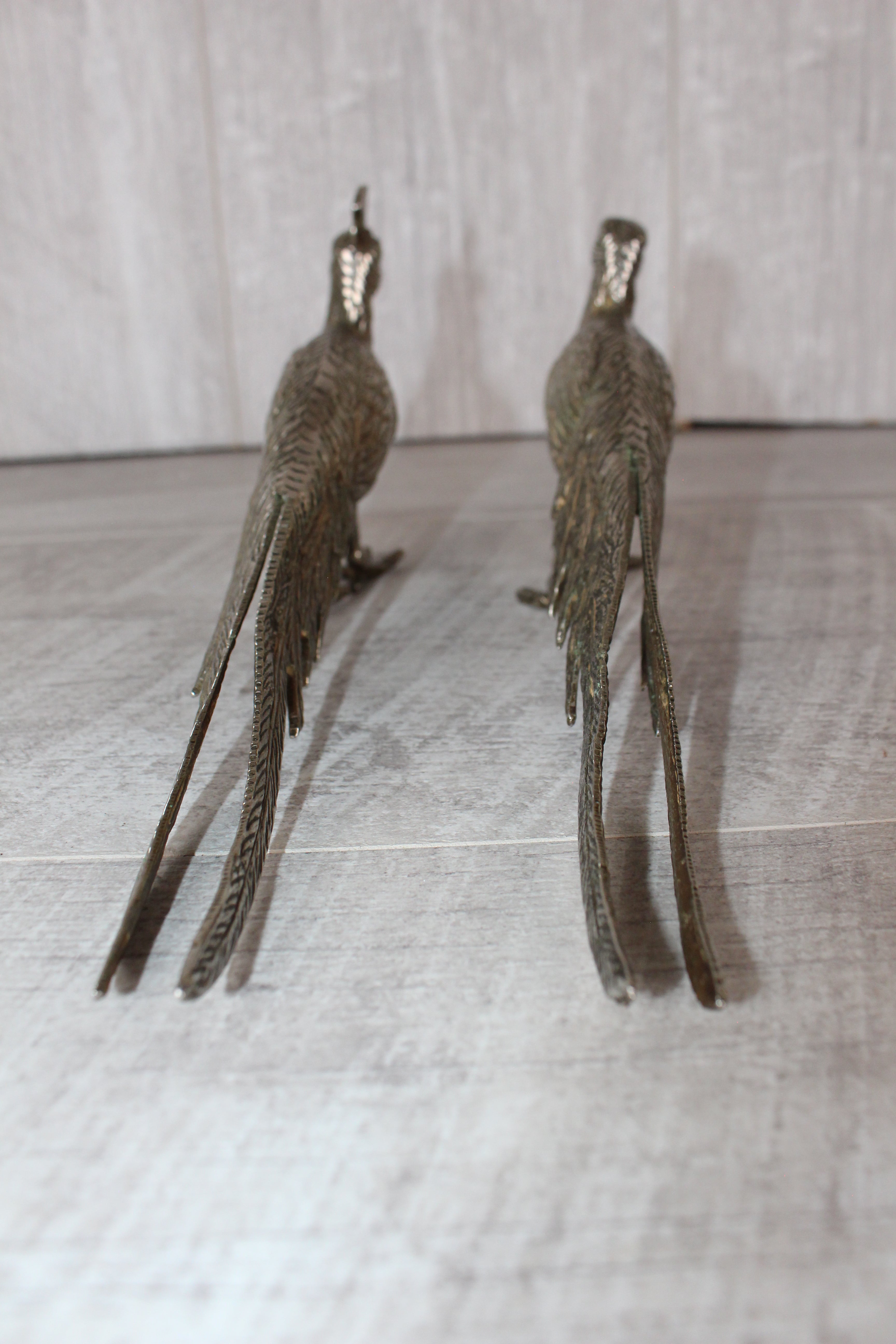 A Pair of Silver Plated Peacocks - Male and Female 10" length