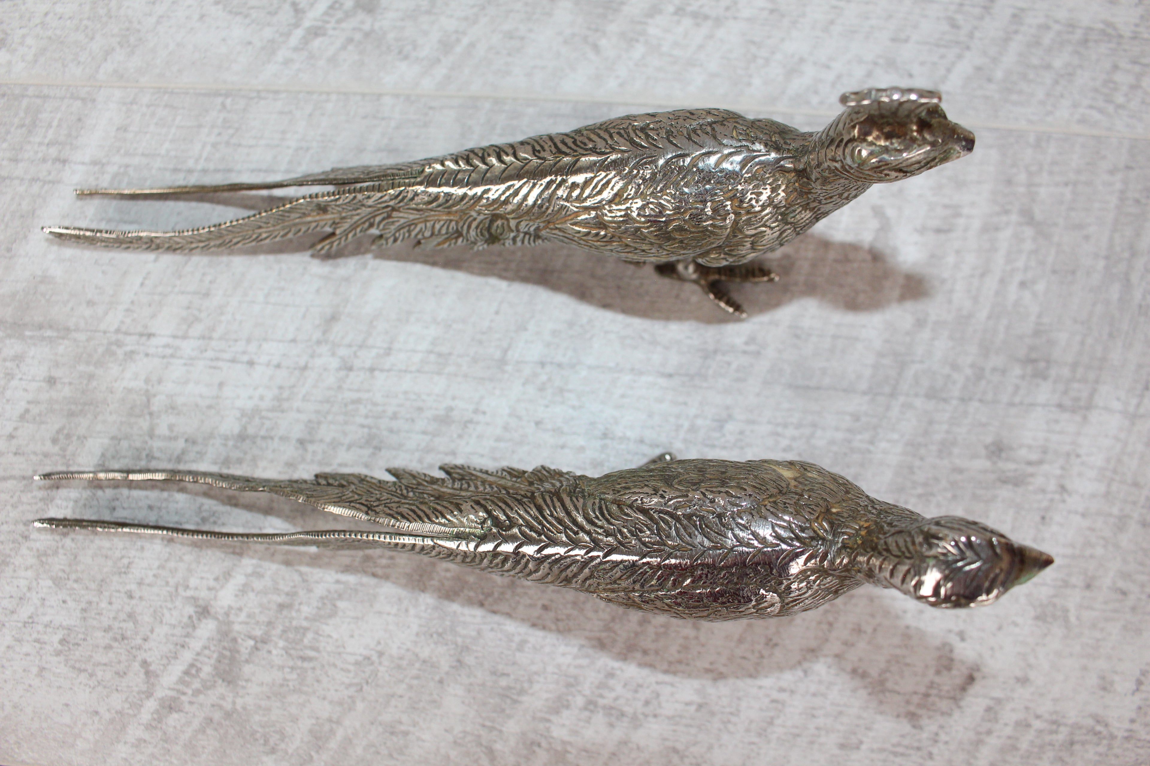 A Pair of Silver Plated Peacocks - Male and Female 10" length