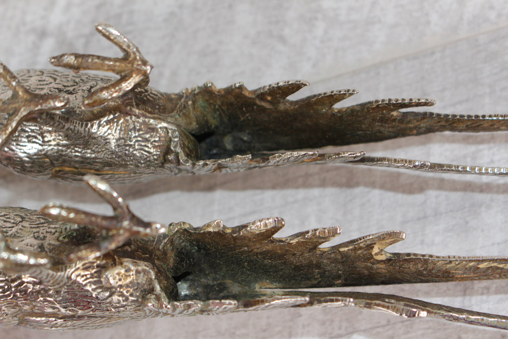 A Pair of Silver Plated Peacocks - Male and Female 10" length