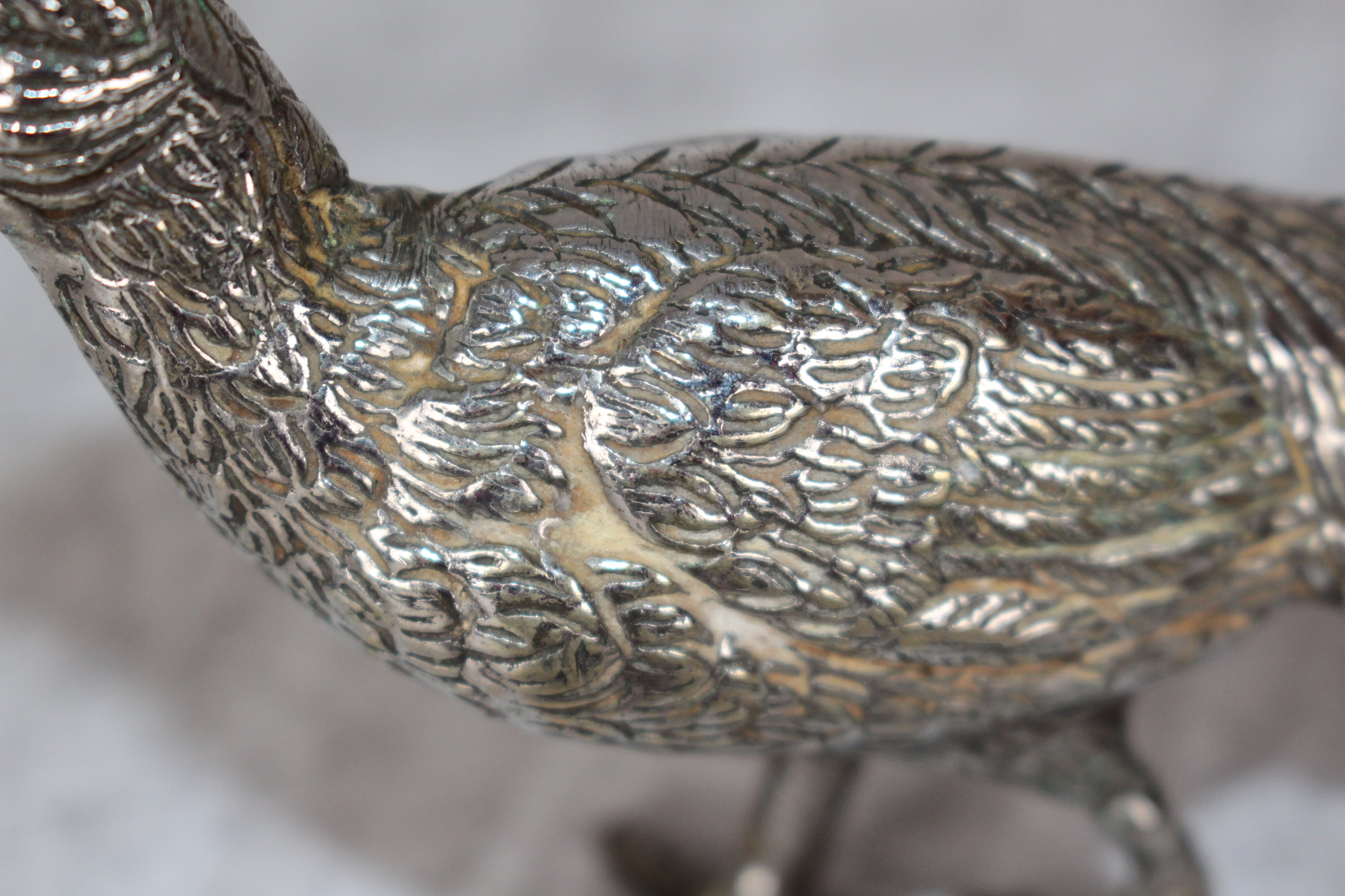 A Pair of Silver Plated Peacocks - Male and Female 10" length