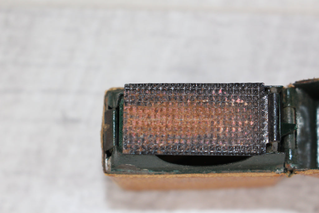 Edwardian metal leatherette covered vesta case, original matches